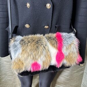 Super cute faux fur purse.